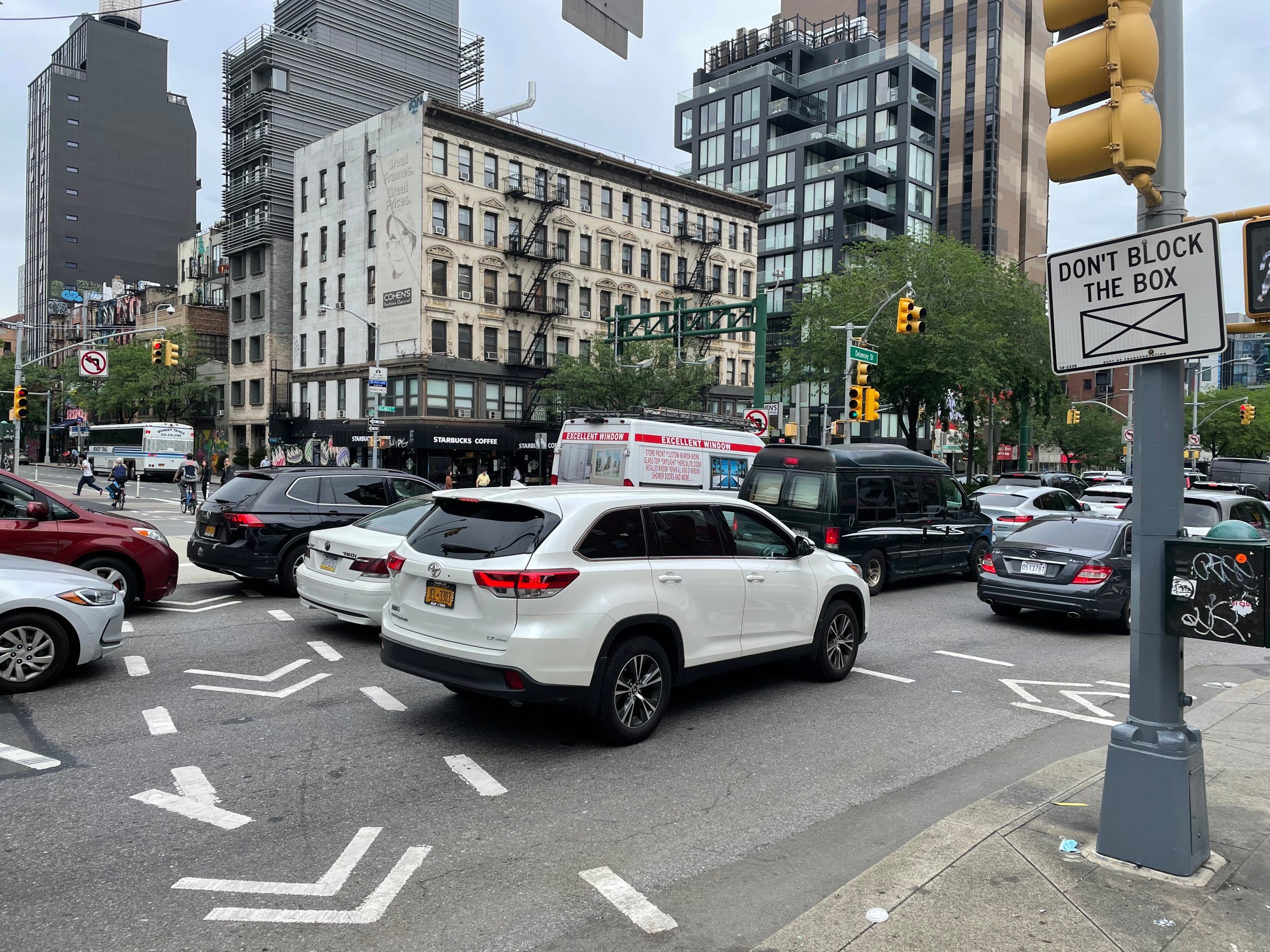 Cars block the intersection in a traffic jam on Delancey Street.