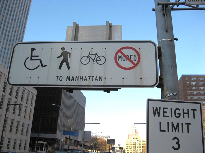 'NO MOPED' sign at ped/bike entrance to the Brooklyn Bridge (date unknown, no longer exists). Photo: Mopedarmy.com