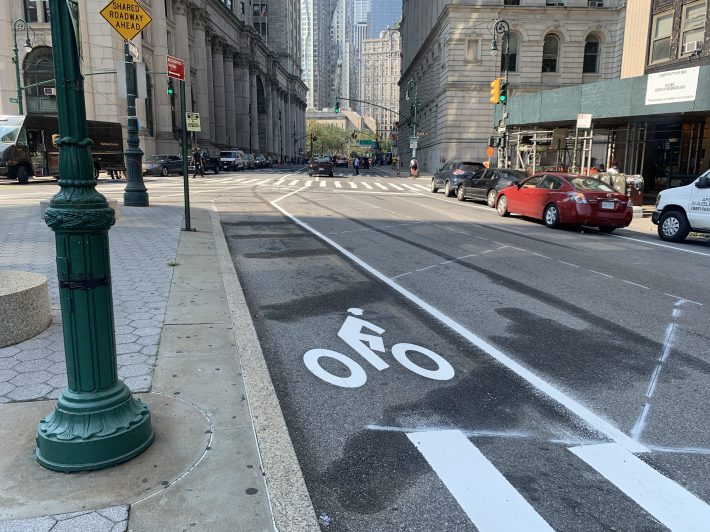 Here's the start of the new painted bike lane on Lafayette Street leading south to the Brooklyn Bridge. If it is not protected, it will be filled with placard cars. Photo: Gersh Kuntzman