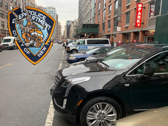 cops on schermerhorn with broken NYPD shield