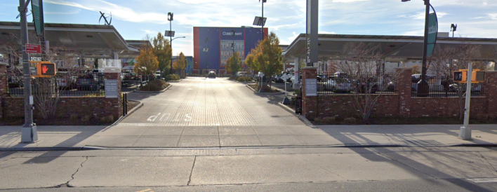Third Street off Third Avenue in Brooklyn — a private parking lot driveway. Such a dangerous "signalized sidewalk" contributed to the death of a toddler on Staten Island. Photo: Google Street view