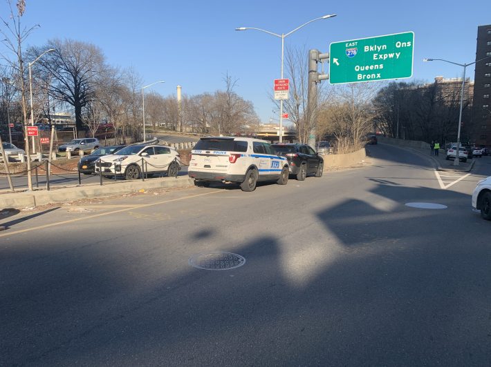 For a second, it looked like a cop pulled someone over. No, it's just illegally parked cars. Photo: Gersh Kuntzman