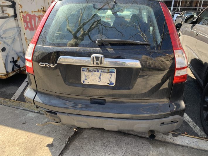 This is a cop's personal vehicle. It is illegal to deface one's plate.