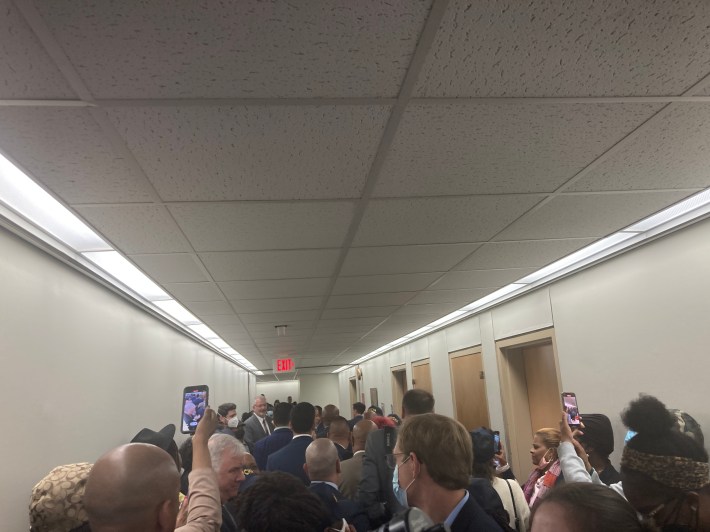 Chaos during Mayor Adams's in-person Q and A on Tuesday in Albany. Photo: Julianne Cuba