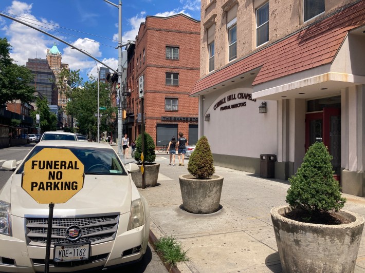 Cobble Hill Chapels on Court Street, with an official funeral director car out front. Photo: Julianne Cuba