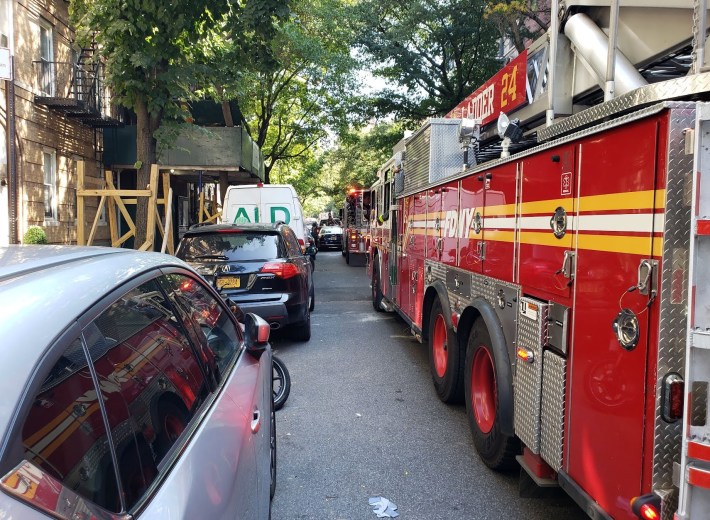 Fire trucks stuck in traffic on W. 22nd Street before it became an Open Street. Photo: Melodie Bryant.