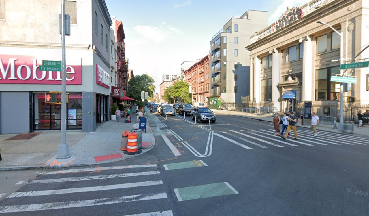 The corner of Grand and Graham has painted markings with some plastic sticks, but drivers can easily ignore them and still make dangerously tight turns. Photo: Google