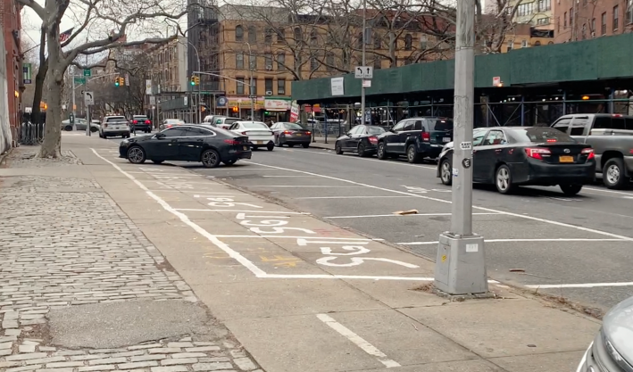 Usually this area is filled with police officers' personal vehicles all combat-parked in front of the station house. Photo: Gersh Kuntzman