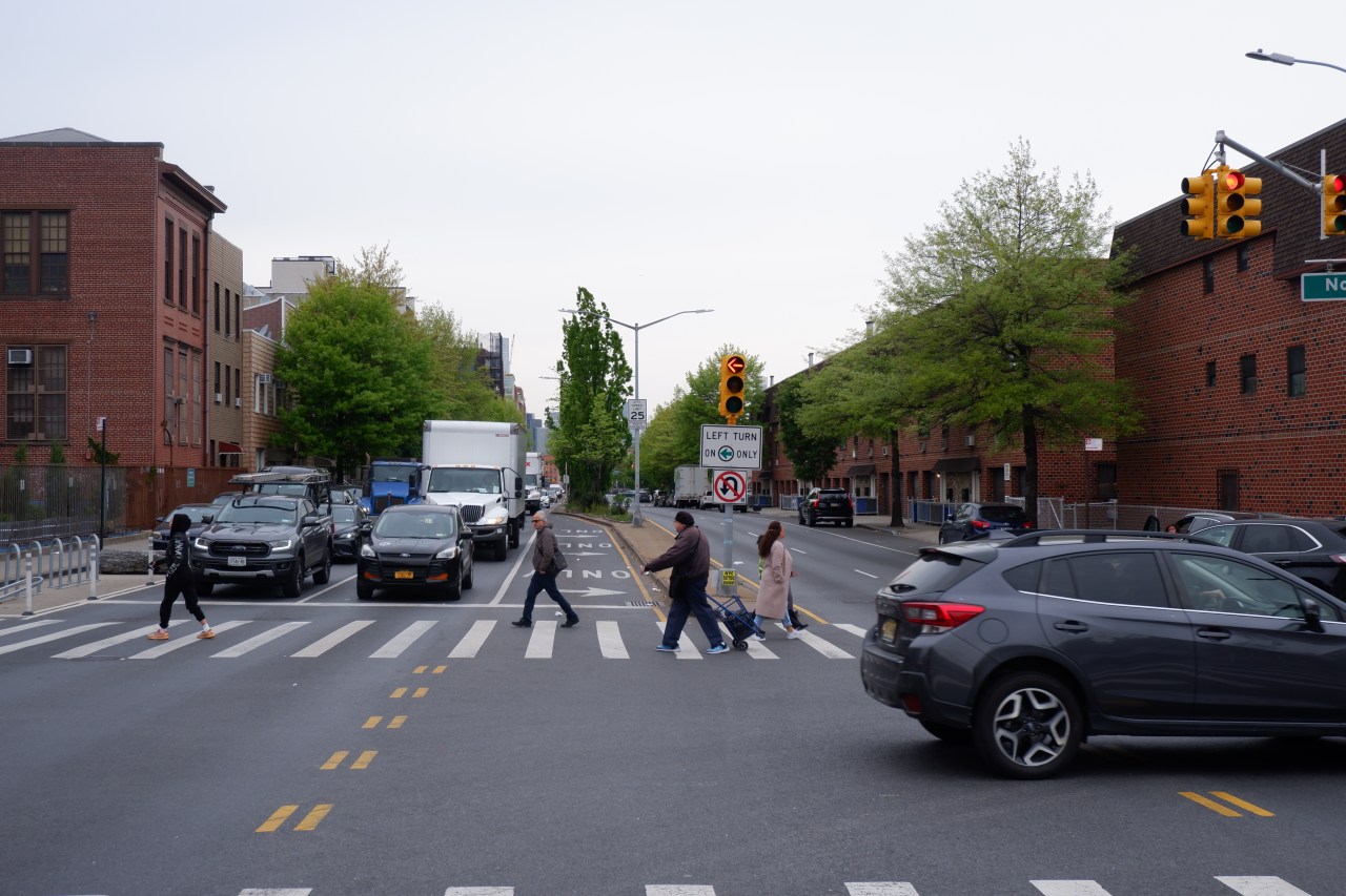 Pedestrians cross highway-like McGuinness Boulevard in Greenpoint. Photo: Kevin Duggan