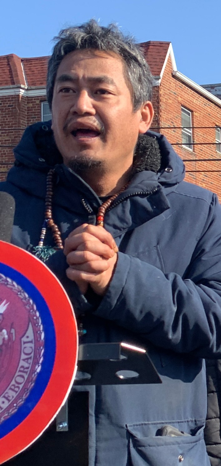 Grieving dad Tsering Wangdu at a recent rally.